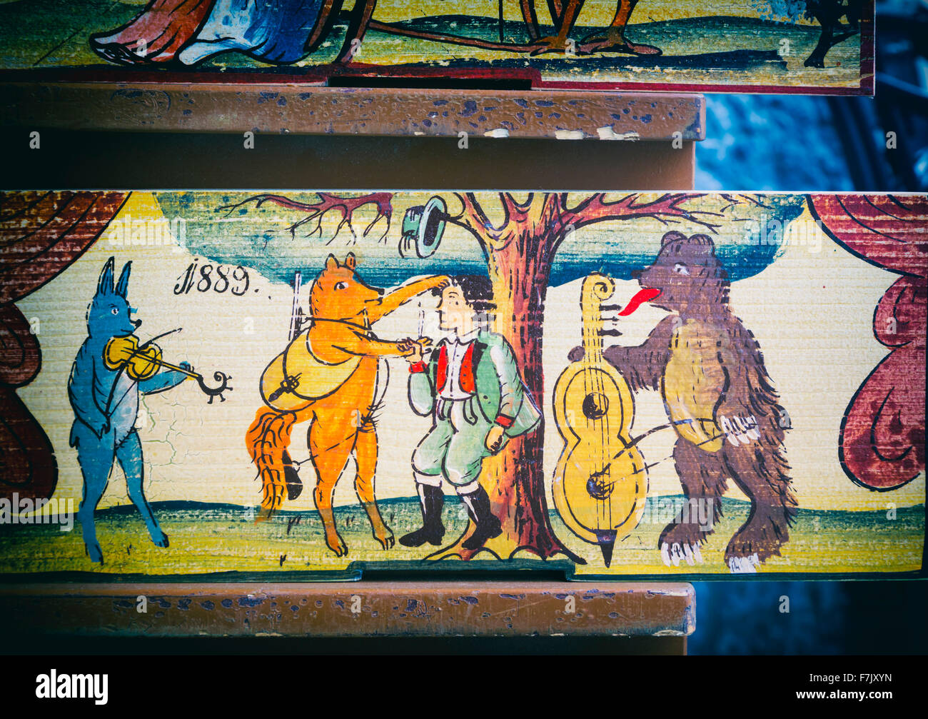 Beehive panels, Slovenia. Copies of originals are a souvenir item with visitors. Originally, the panels decorated beehives. Stock Photo