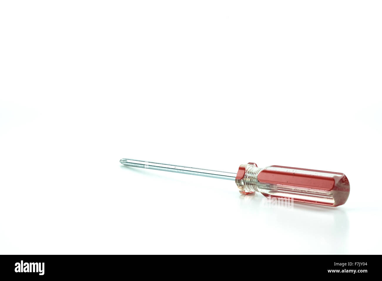Red screwdriver, isolated in white background Stock Photo