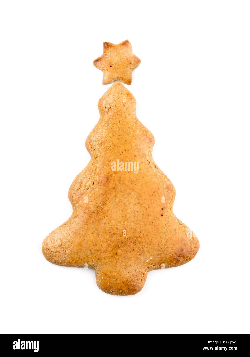Christmas tree-like gingerbread cookie on white background Stock Photo
