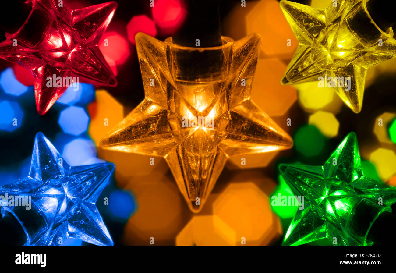 Macro shot of star shaped festive lights.Christmas fairy lights Stock Photo