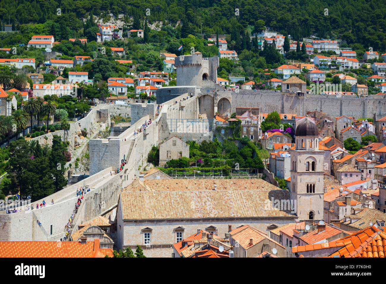 Dubrovnik, Dubrovnik-Neretva County, Croatia. Visitors on walkway of walls of the old city. Stock Photo