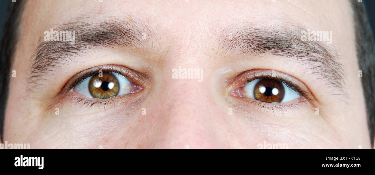 Man with heterochromia iridum: different color eyes Stock Photo