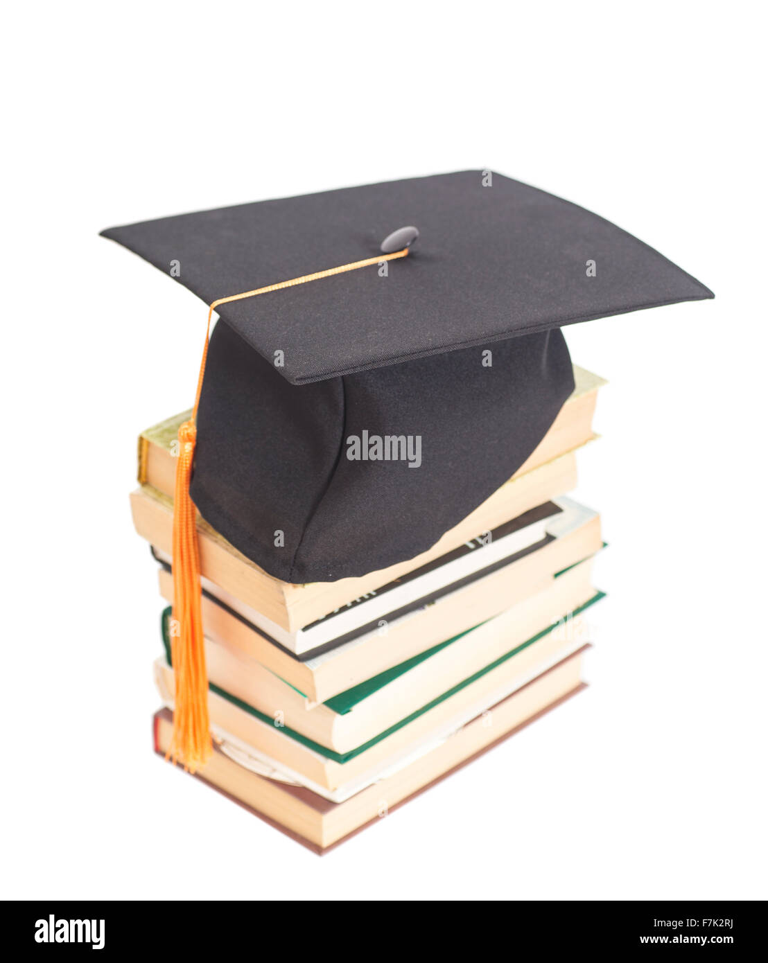 Graduation Hat with books isolated on white Stock Photo