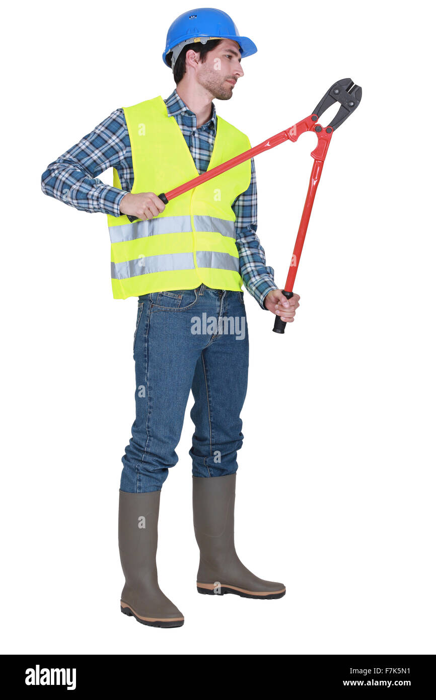 Man holding bolt cutters Stock Photo Alamy