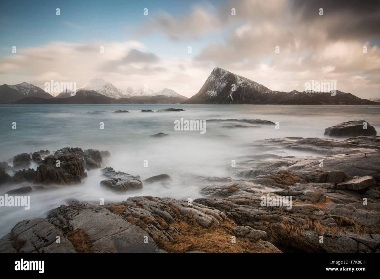 Scenic view mountains and cold craggy ocean, Vagje Lofoten Islands, Norway Stock Photo