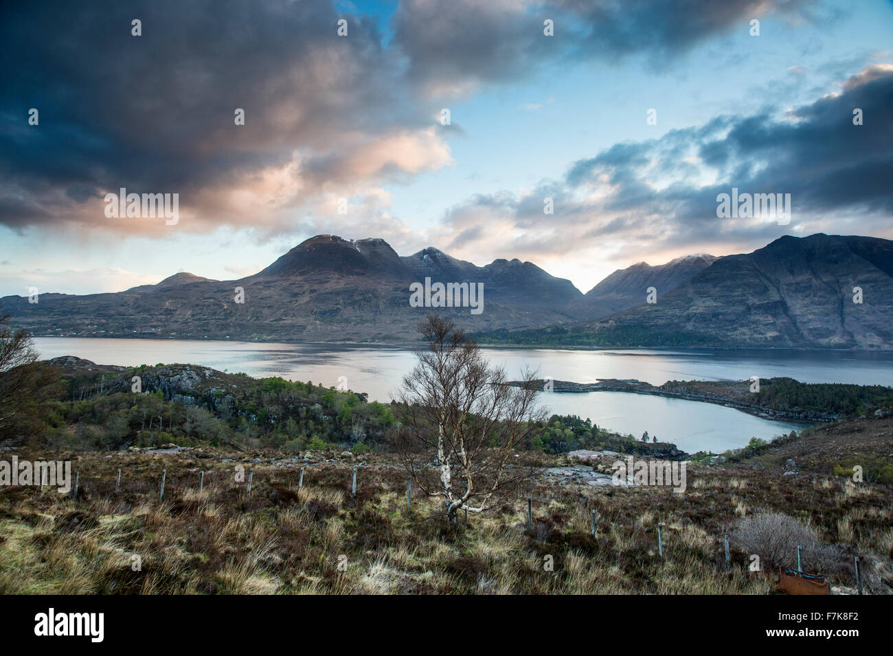 Scenic view clouds over calm mountains and lake, Russel Burn ...