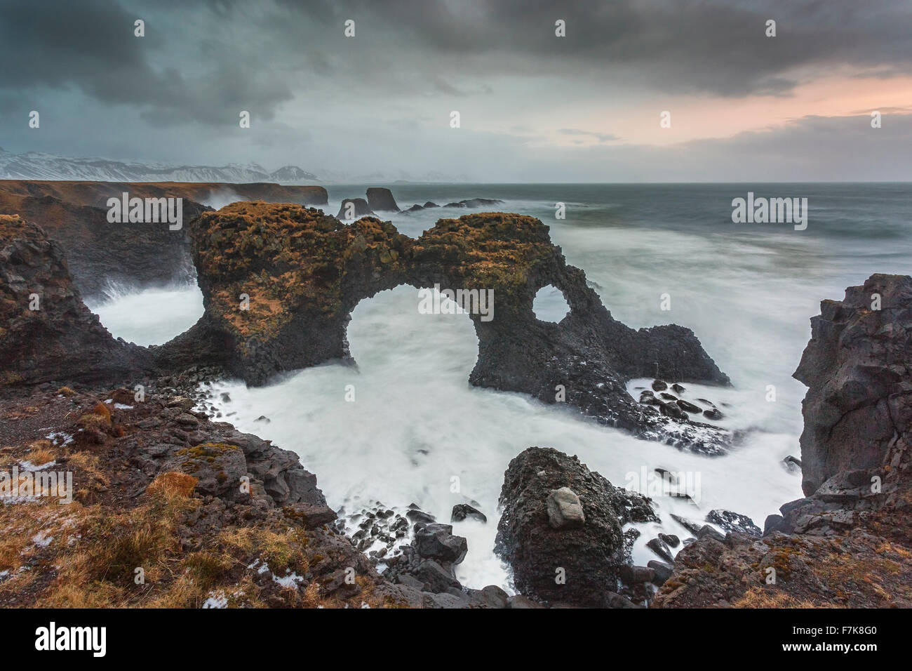 Rock formations among stormy ocean, Amarstapi, Snaefellsnes, Iceland Stock Photo