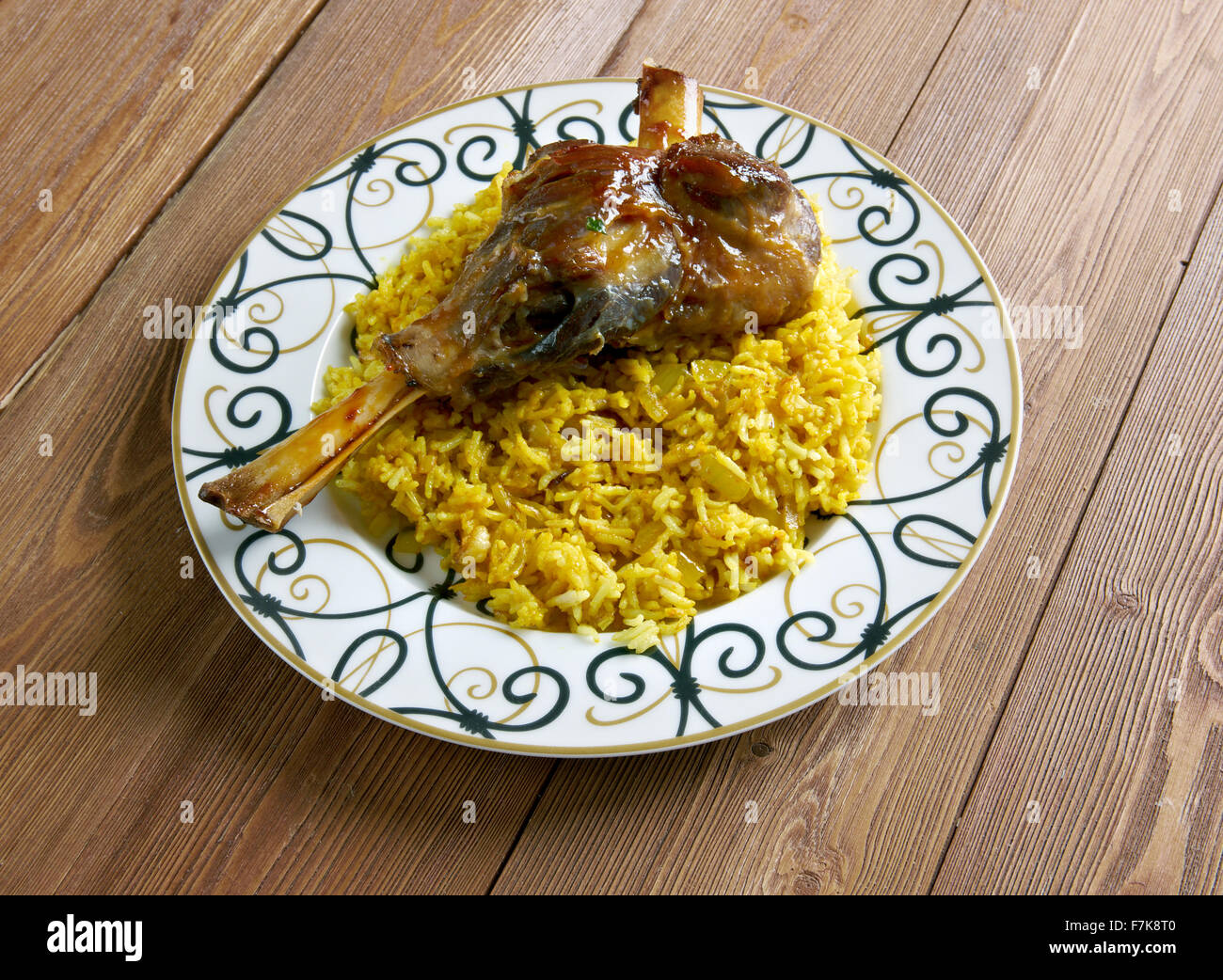 Indianspiced leg of lamb with pilau rice Stock Photo Alamy