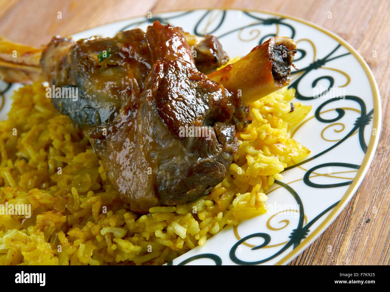 Indianspiced leg of lamb with pilau rice Stock Photo Alamy