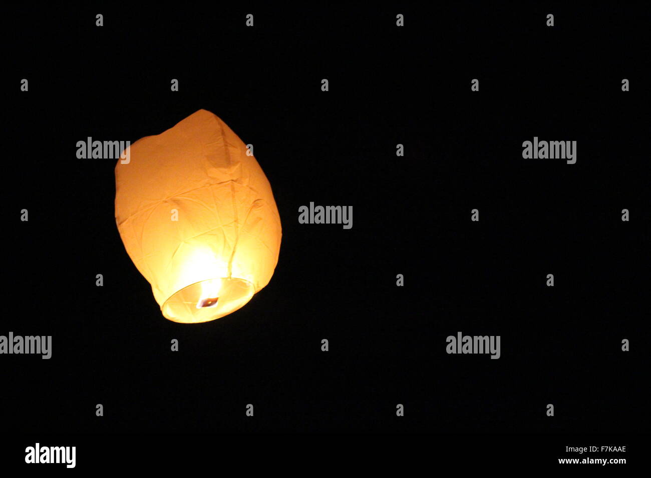 Flying Chinese lantern in the night sky Stock Photo Alamy