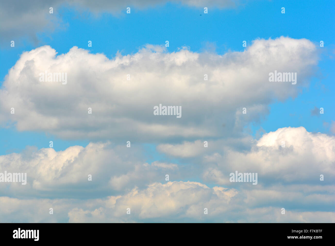 white fluffy clouds in the blue sky Stock Photo - Alamy
