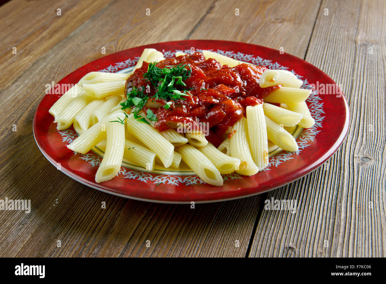 Penne pasta with sauce arrabiata. spicy sauce for pasta made from