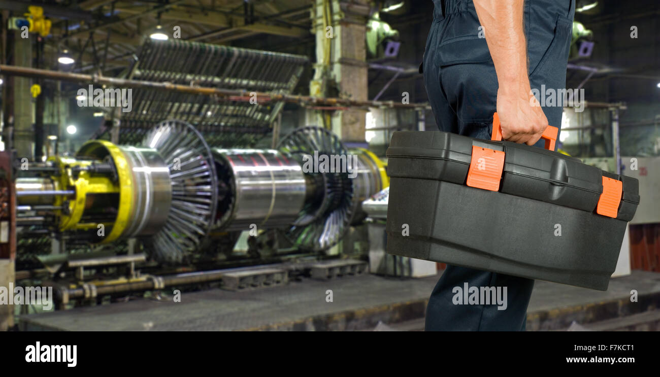 Worker with instruments Stock Photo - Alamy