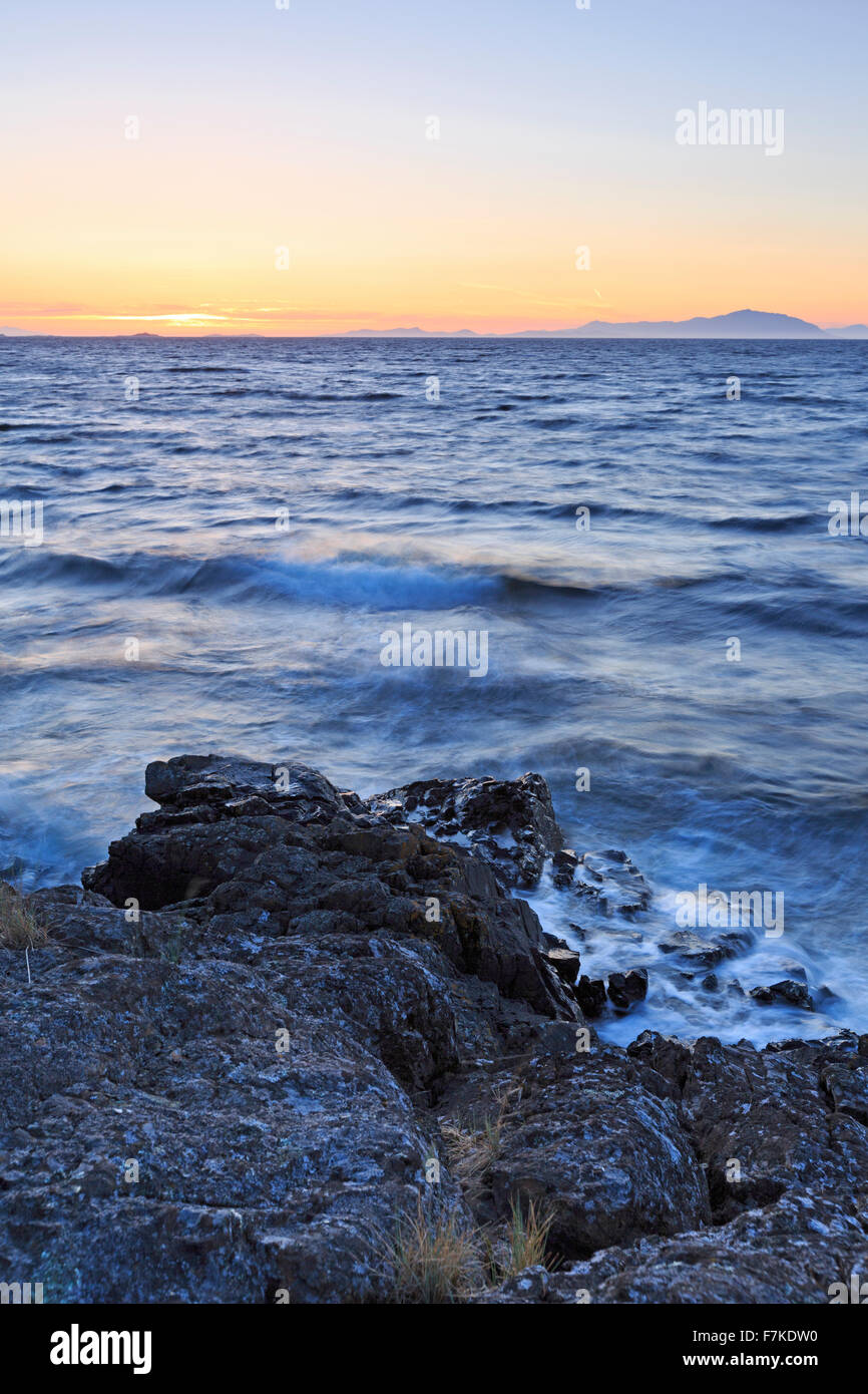 Sunset over Georgia Strait from Neck Point Municipal Park, north Nanaimo, Vancouver Island, British Columbia Stock Photo