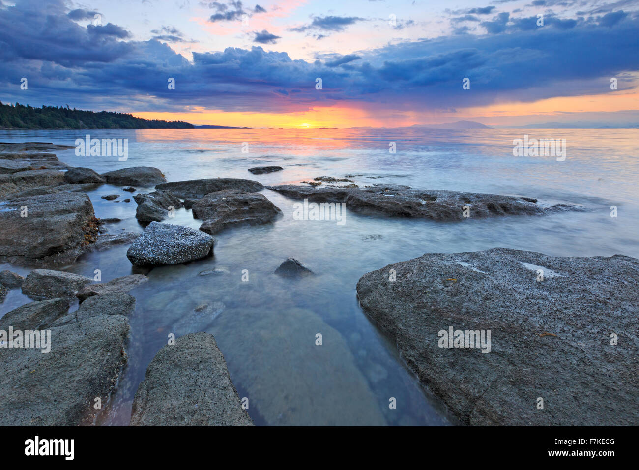 Sunset over Georgia Strait from beach in north Nanaimo, Vancouver Island, British Columbia Stock Photo