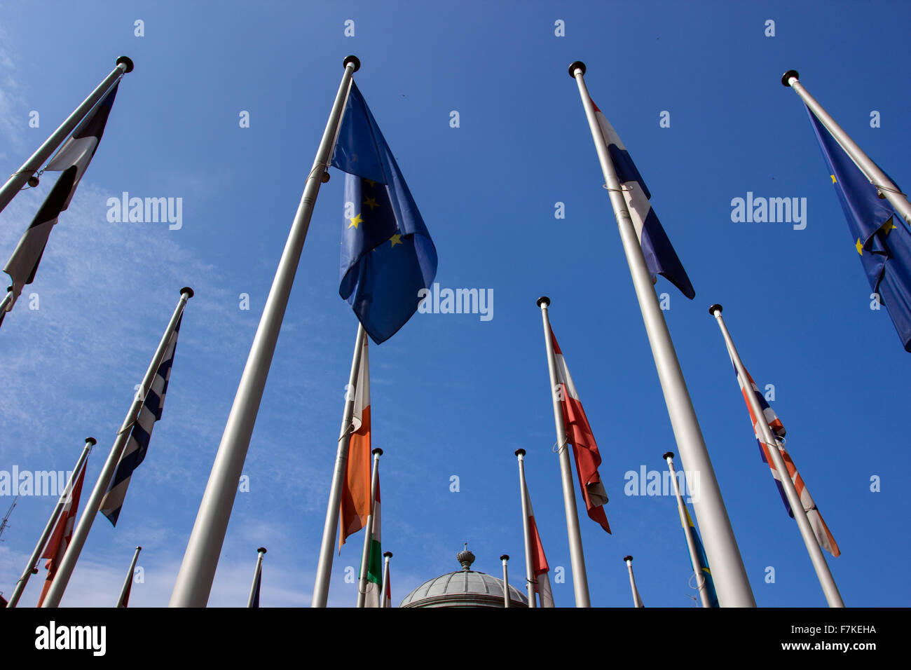 Country flags against a blue sky Stock Photo - Alamy