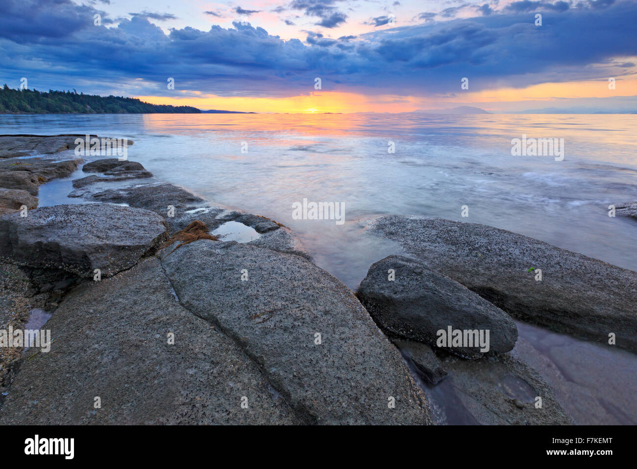 Sunset over Georgia Strait from beach in north Nanaimo, Vancouver Island, British Columbia Stock Photo