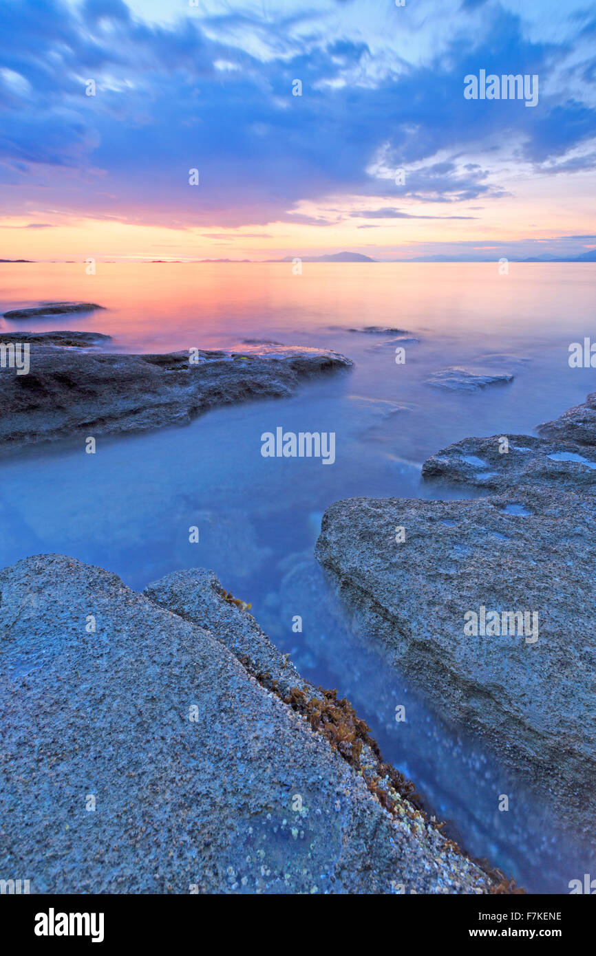Sunset over Georgia Strait from beach in north Nanaimo, Vancouver Island, British Columbia Stock Photo