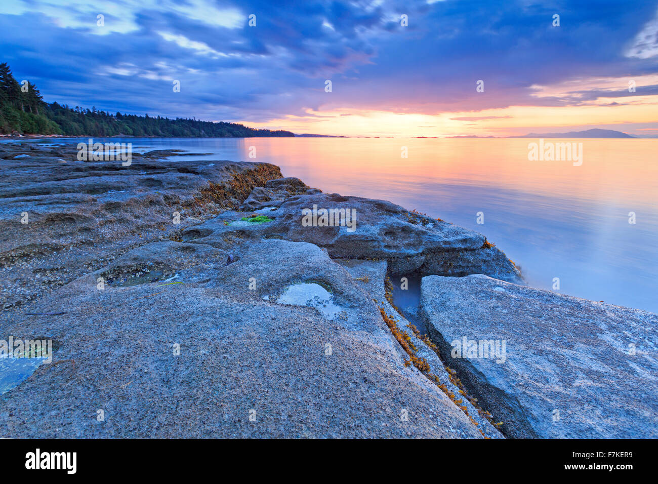 Sunset over Georgia Strait from beach in north Nanaimo, Vancouver Island, British Columbia Stock Photo