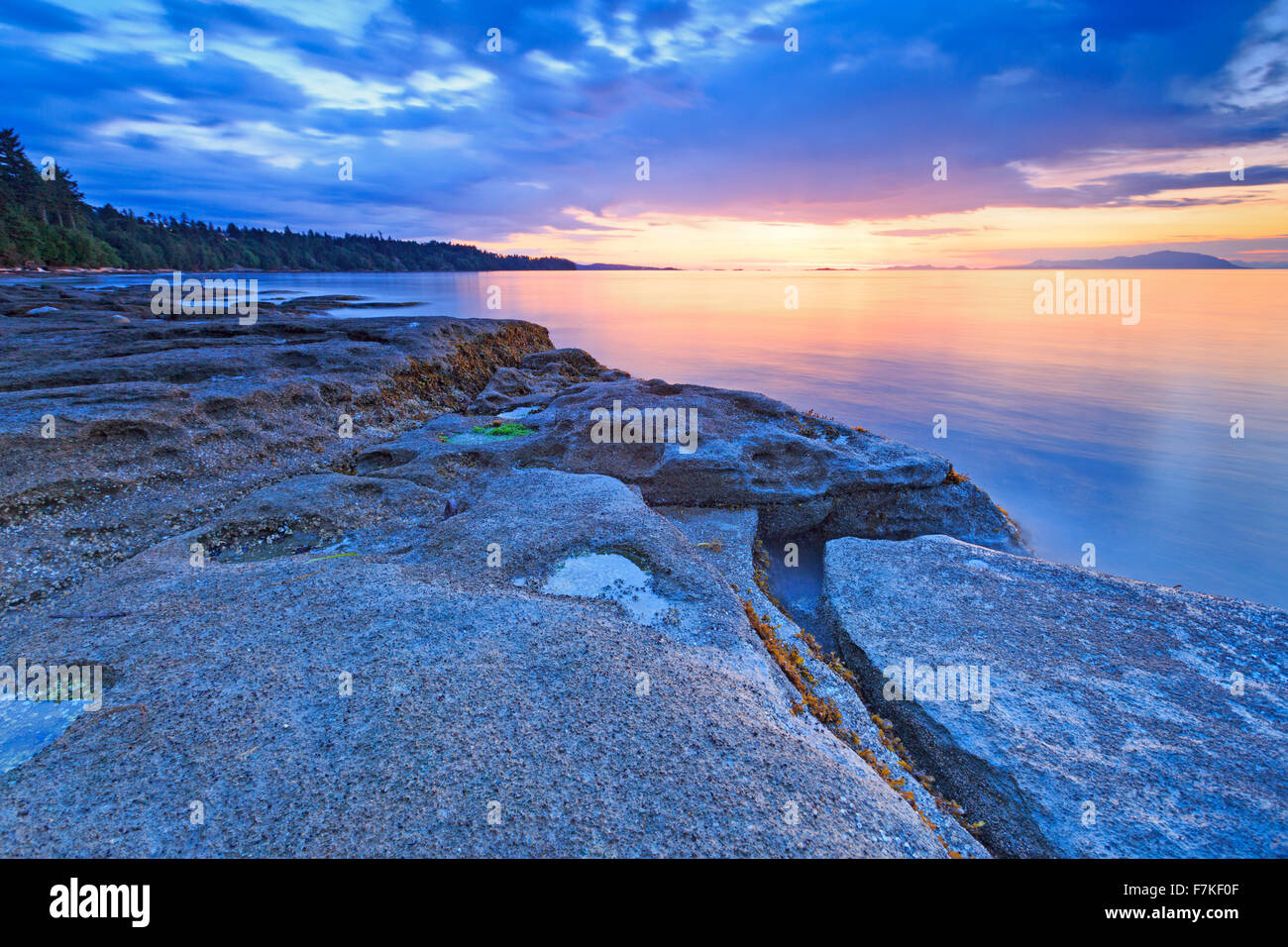 Sunset over Georgia Strait from beach in north Nanaimo, Vancouver Island, British Columbia Stock Photo