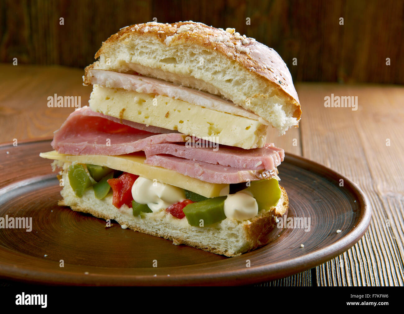 Mufulleta Muffuletta - type of round Sicilian sesame bread and a popular sandwich ...