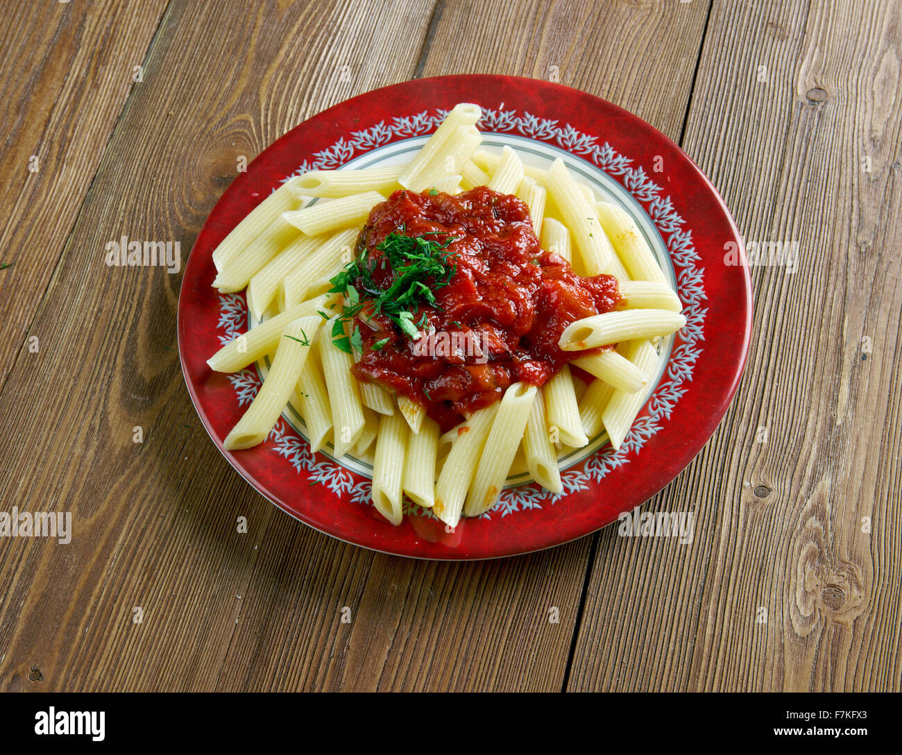 Penne pasta with sauce arrabiata. spicy sauce for pasta made from