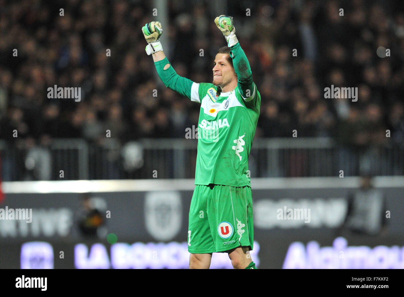 Stade Jean-Bouin, Angers, France. 01st Dec, 2015. French League 1 football. Newky promoted Angers Sporting Club versus paris St Germain. LUDOVIC BUTELLE (sco) celebrates at full time. Angers were happy to hold PSG to a scoreless draw (0-0) Credit:  Action Plus Sports/Alamy Live News Stock Photo