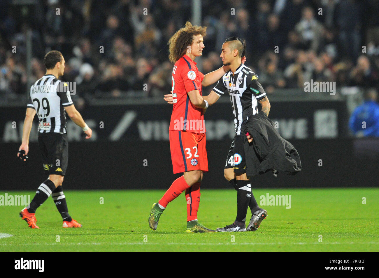 Stade Jean-Bouin, Angers, France. 01st Dec, 2015. French League 1 football. Newky promoted Angers Sporting Club versus paris St Germain. DAVID LUIZ (psg) shakes hands with Billy KETKEOPHOMPHONE (sco) Angers were happy to hold PSG to a scoreless draw (0-0) Credit:  Action Plus Sports/Alamy Live News Stock Photo