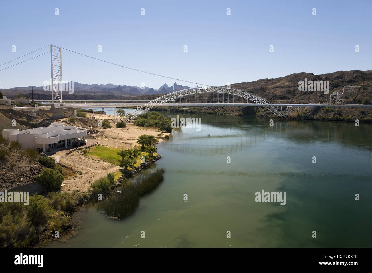 Bridge crossing Colorado River with turquoise color water from Needles