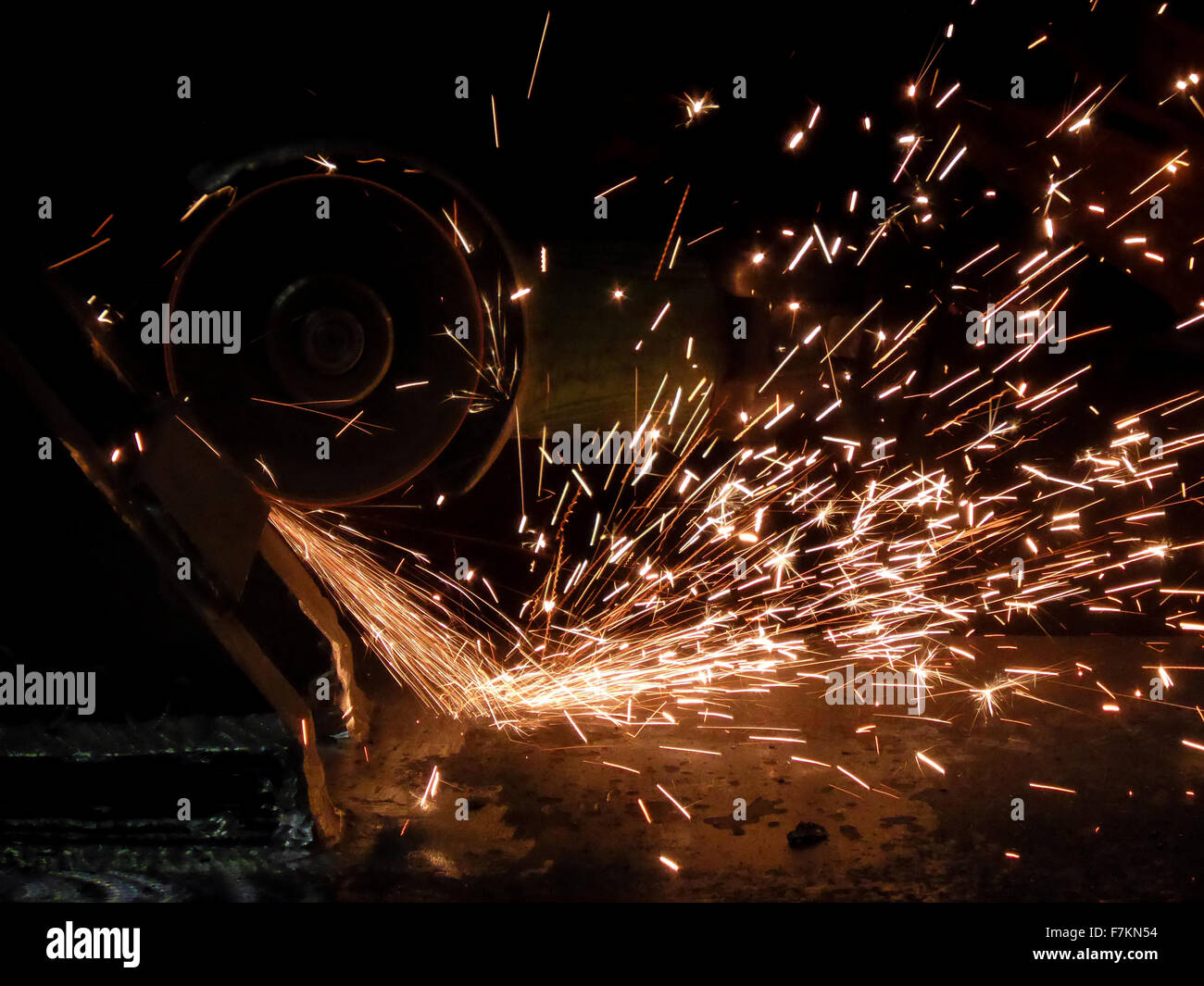 Flying sparks from welding wheel Stock Photo