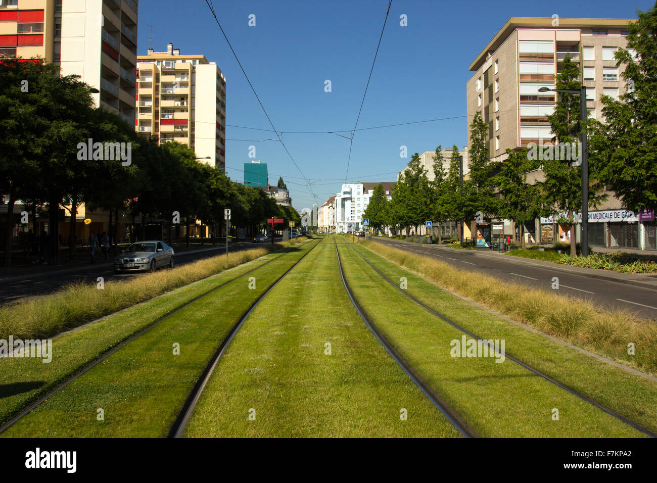 Mulhouse tram lines with artificial turf Stock Photo - Alamy