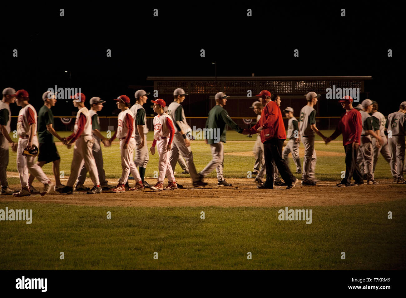 Nashoba Chieftans high school baseball team shakes hands with winning team, western MA, outside of Boston Stock Photo