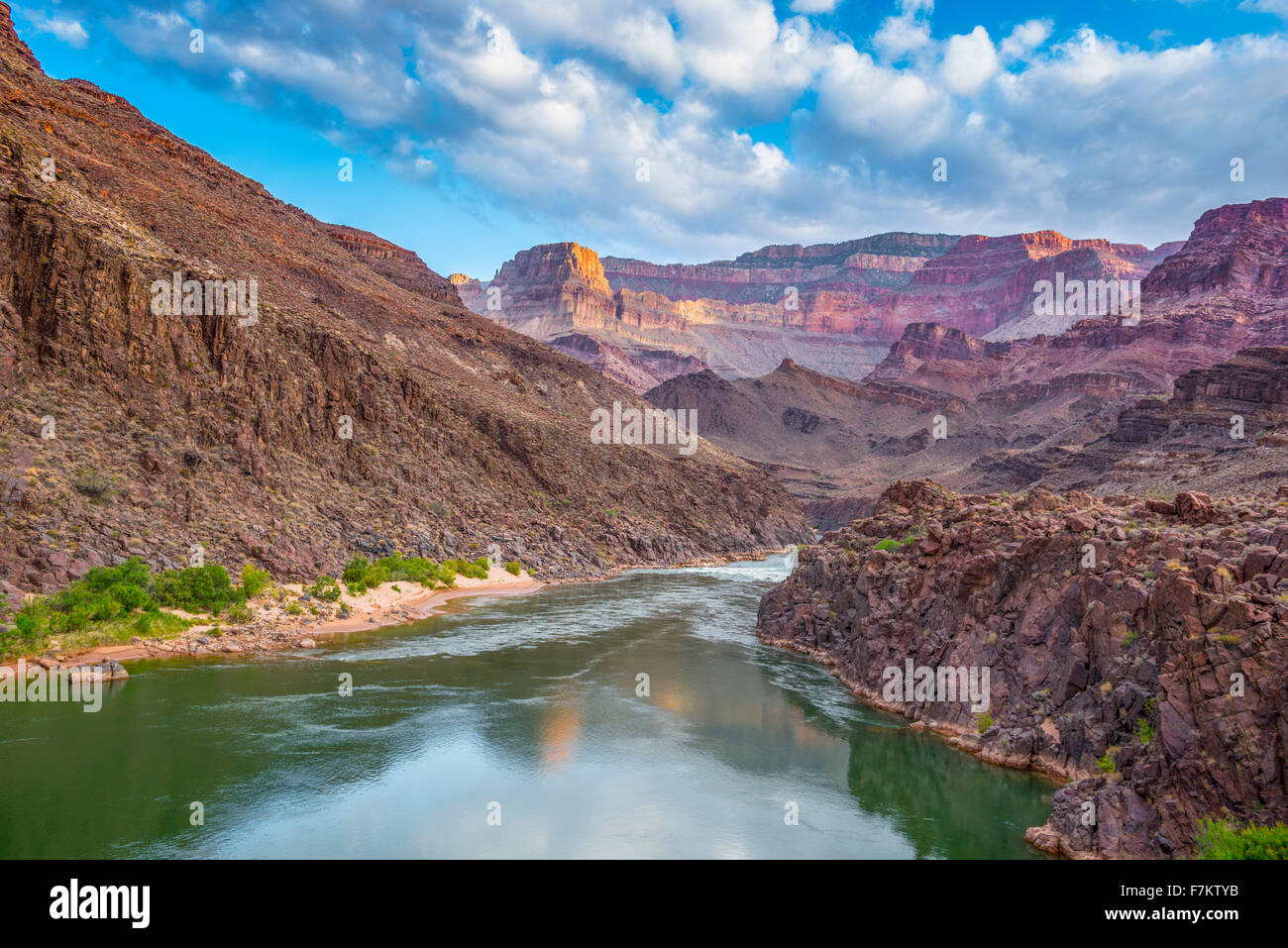 Morning clouds reflected in the Colorado River, Grand Canyon National Park, Arizona, Powell PLateau beyond Stock Photo