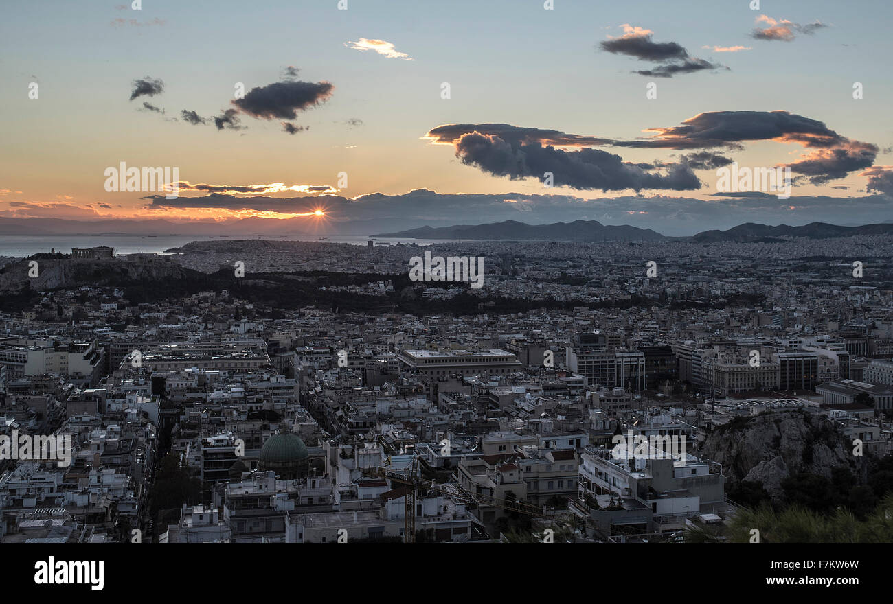 Sunset over the Parthenon Temple on Acropolis Hill in Athens, Greece, on 28 November 2015. © Elias Verdi/ Alamy Stock Images Stock Photo