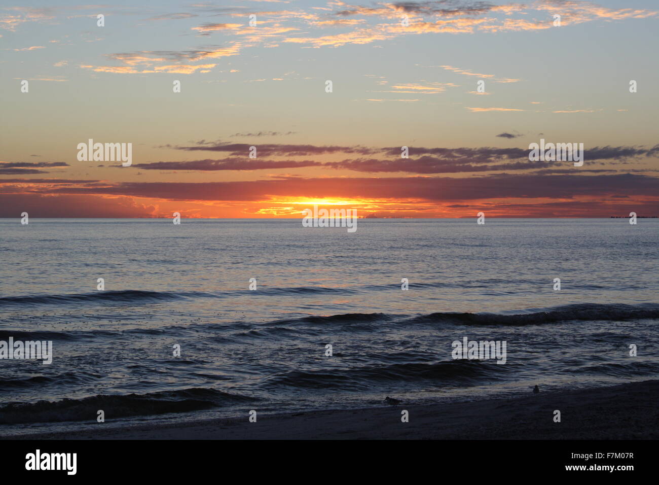 Sunset at the Beach Stock Photo - Alamy