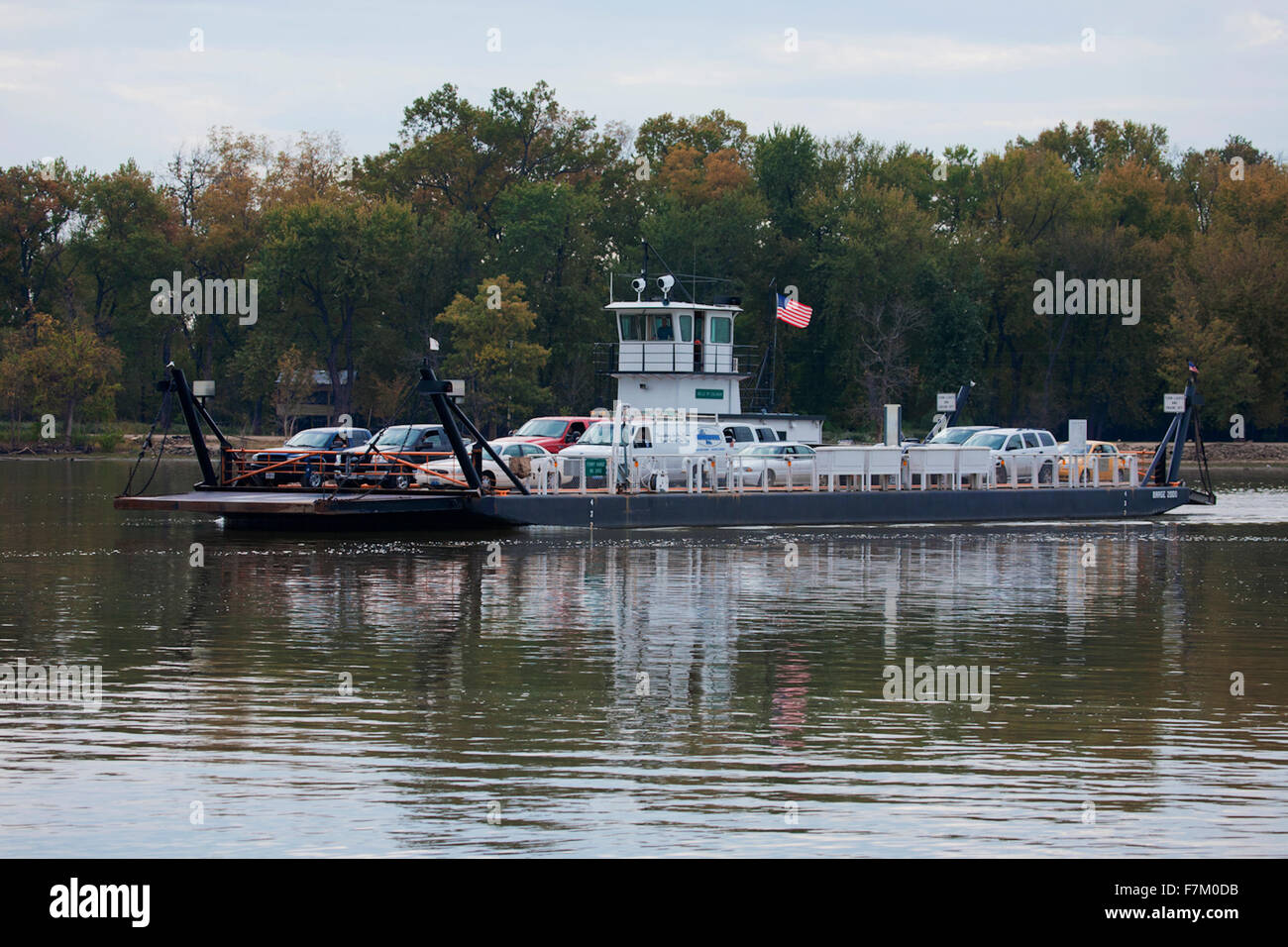 Belle of Calhoun ferry boat shuttlesat Brussels, Il. Is a free ferry carrying cars across the Mississippi and Illinois River to Missouri Stock Photo