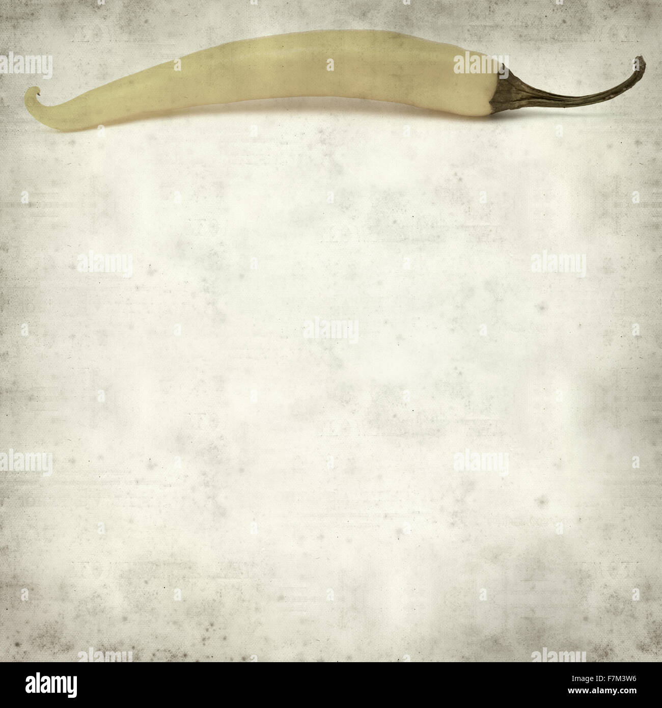 textured old paper background with yellow chilli pepper Stock Photo - Alamy