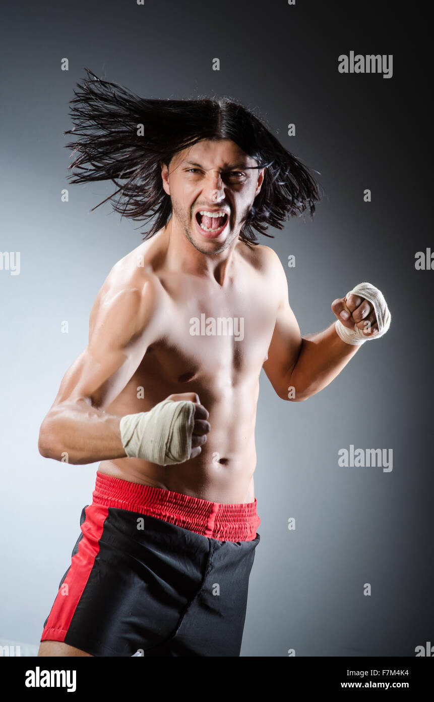 Aggressive Ripped Ripped martial arts expert at training Stock Photo - Alamy