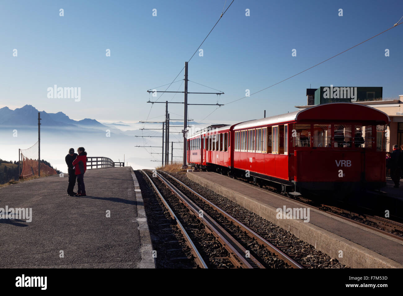 Red cog rail train car on summit of Mount Rigi, Switzerland, Europe Stock Photo