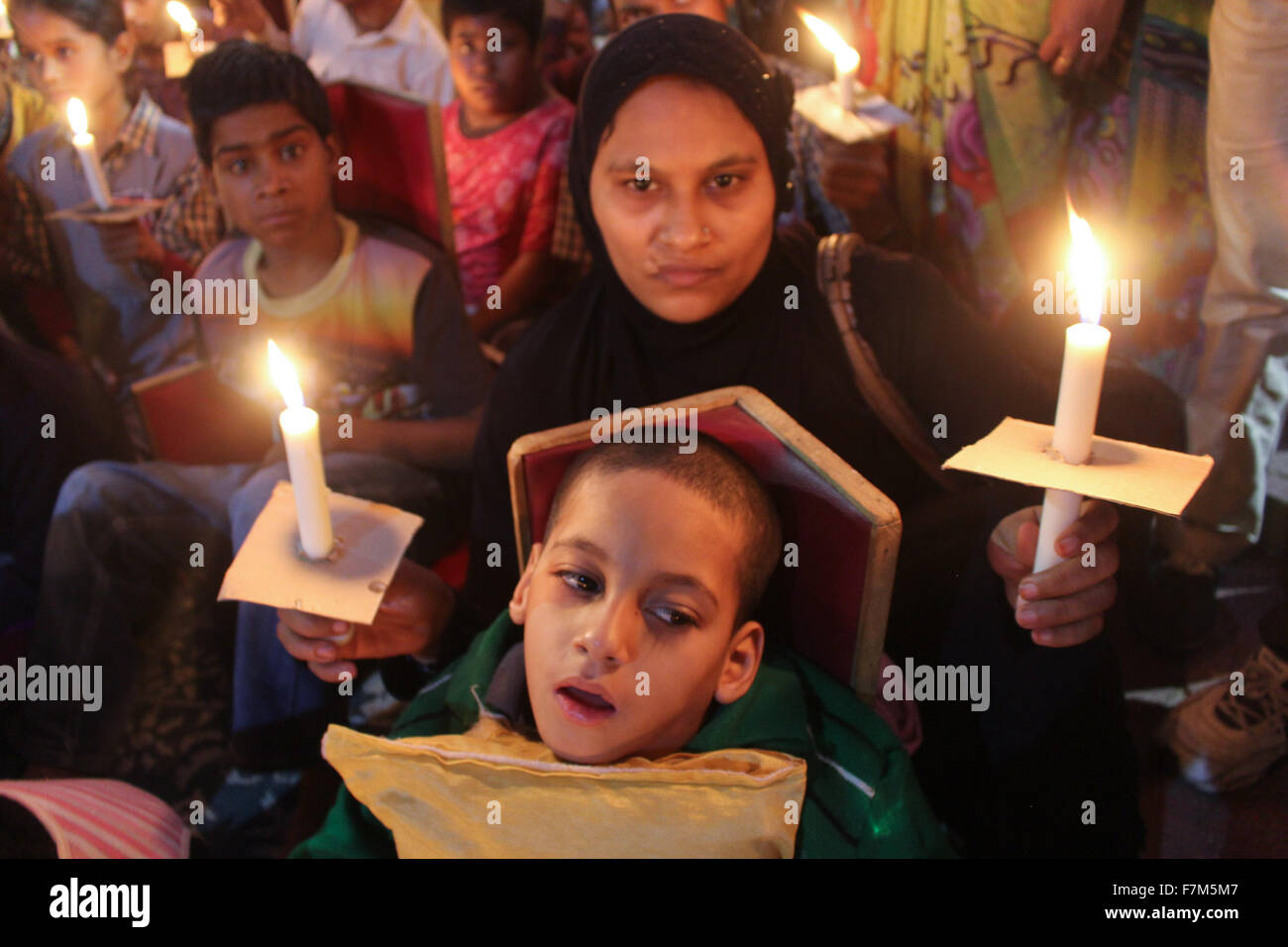 Bhopal, India. 1st Dec, 2015. People light candles during a vigil marking the 31st anniversary of the gas tragedy in Bhopal, India, Dec. 1, 2015. More than 15,000 residents were killed by the gas leakage from the Union Carbide pesticide plant on the night of Dec. 2 to 3, 1984 in Bhopal, considered the world's worst industrial disaster. © Stringer/Xinhua/Alamy Live News Stock Photo