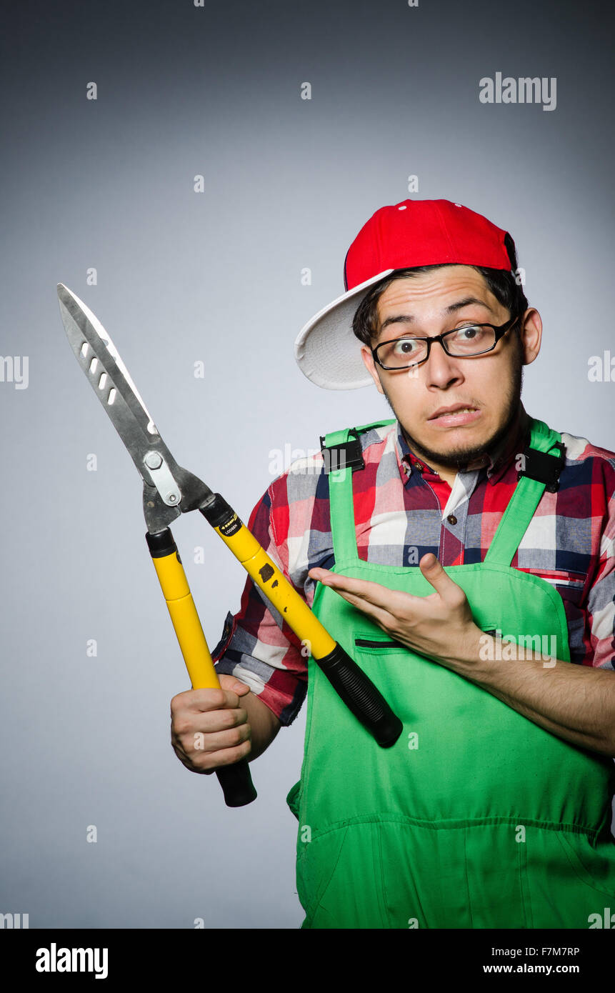 Funny man with giant shears Stock Photo Alamy
