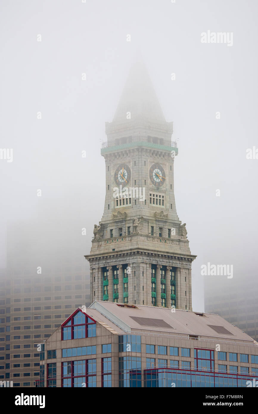 Commerce House Tower (built 1910) and Boston Skyline in deep fog, Boston, MA Stock Photo