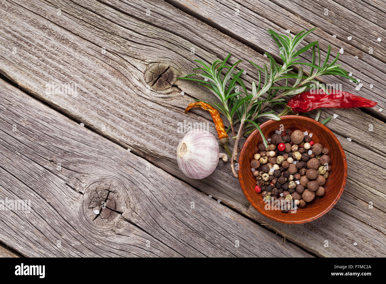 Herbs and spices on wooden table with copy space Stock Photo