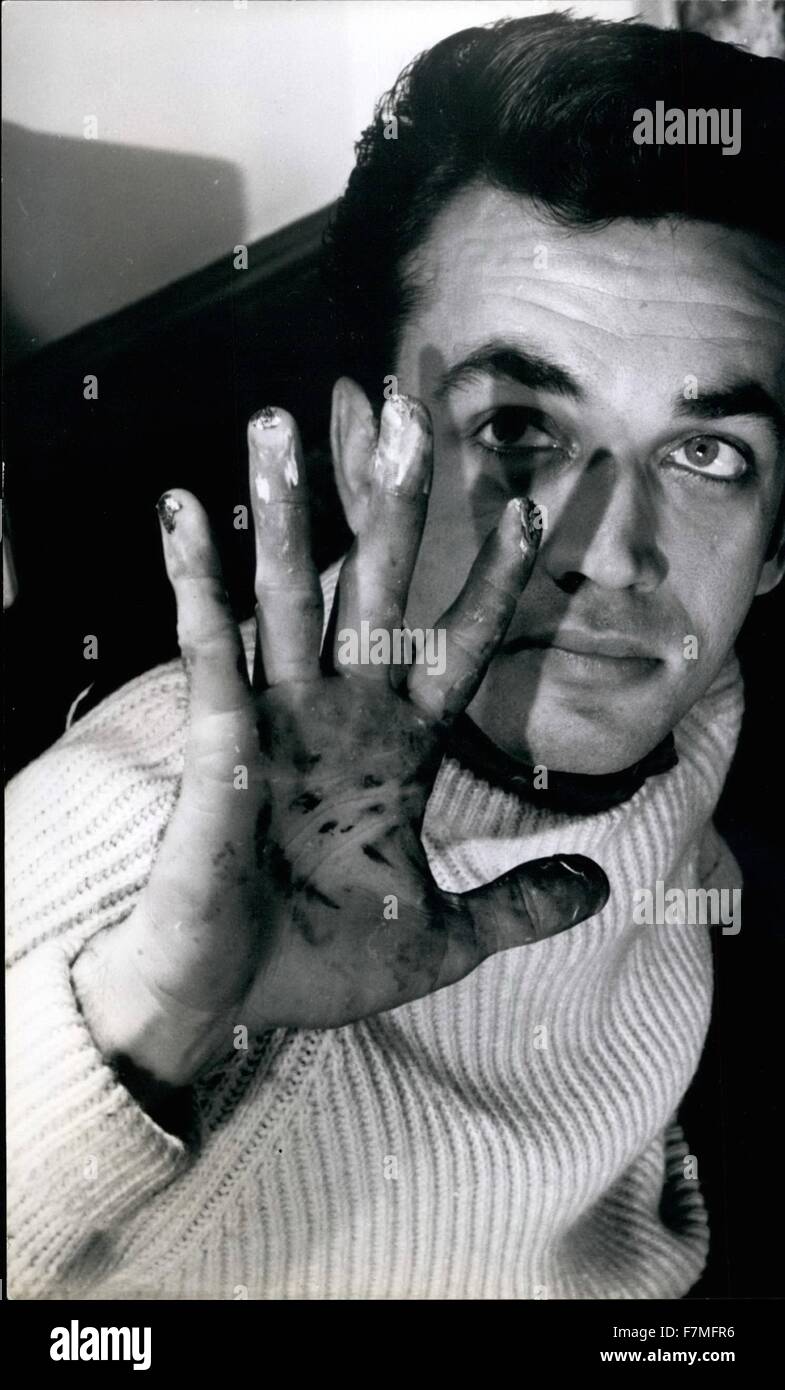 1963 Beven shows his fingertips after finishing a picture