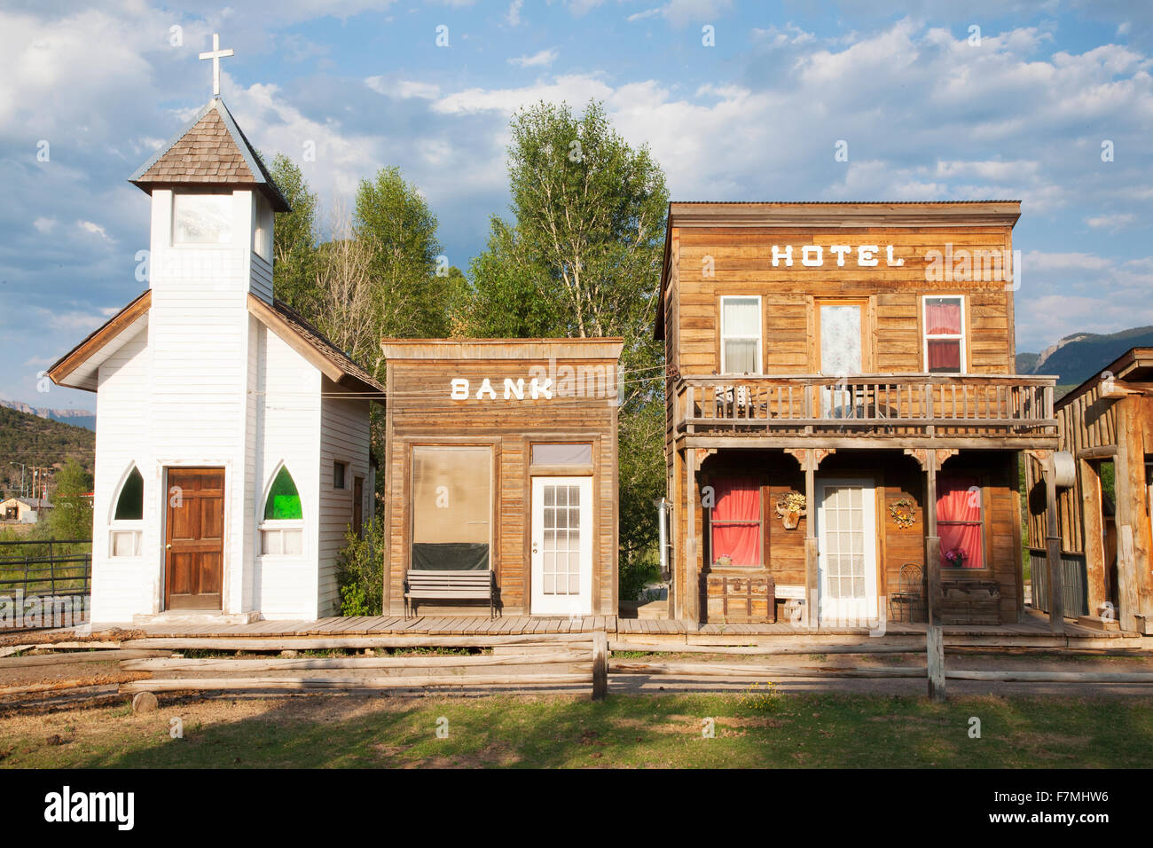 Western storefronts with church, hotel and bank, Ridgway, Colorado Stock Photo