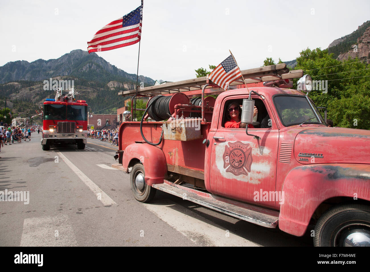 Antique Ridgway firetruck drives drives in July 4 Independence Day Parade, Ouray, Colorado Stock Photo