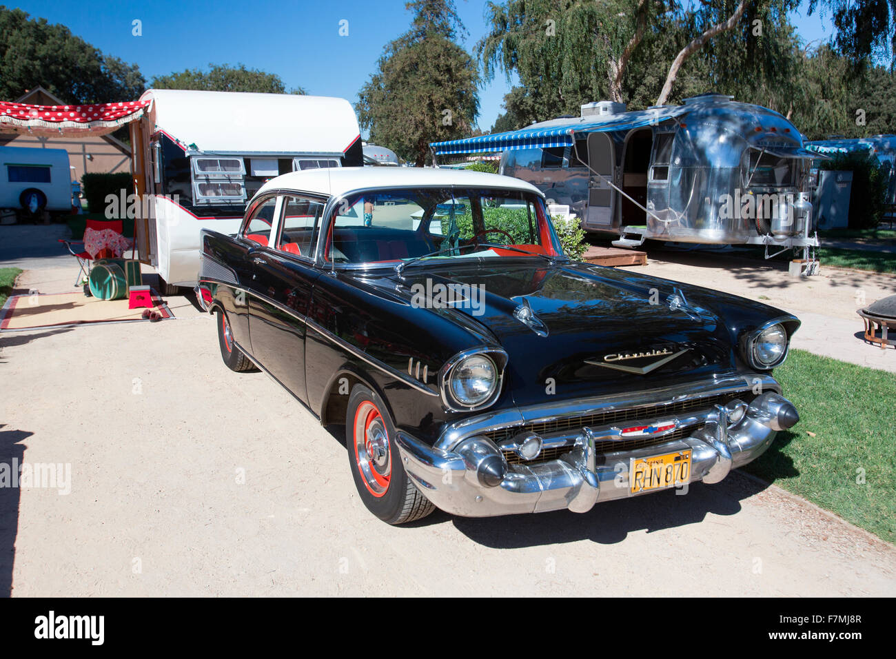 Exterior view of a vintage trailer and 1957 Chevrolet car, at the 4th Annual Vintage Trailer