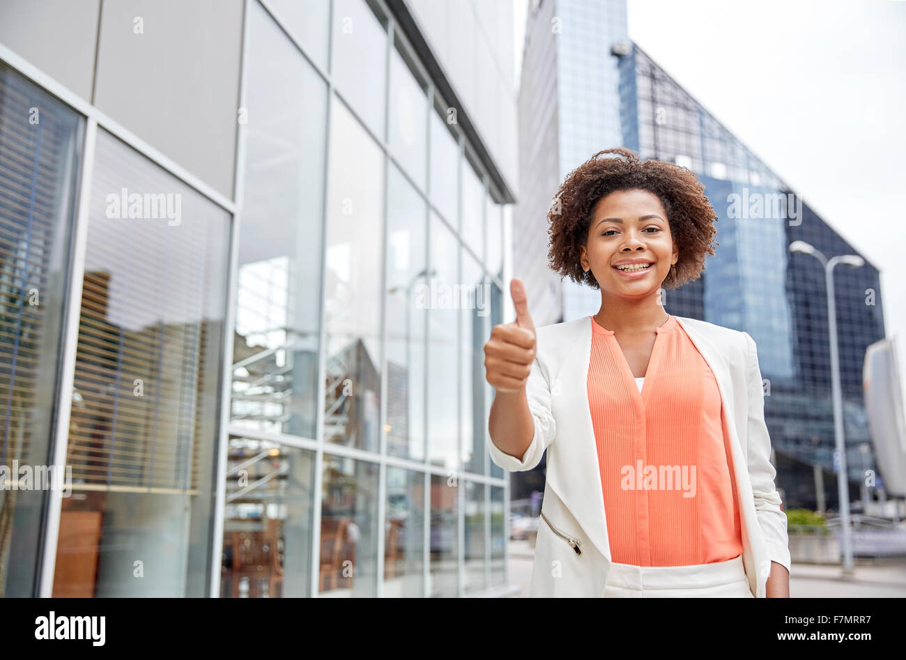 African american woman thumbs up hi-res stock photography and images ...