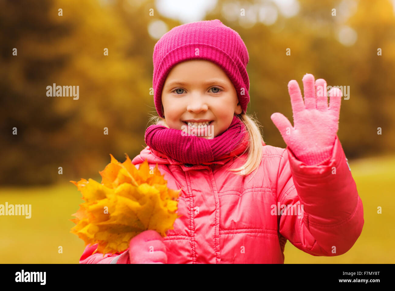 happy beautiful little girl portrait outdoors Stock Photo - Alamy