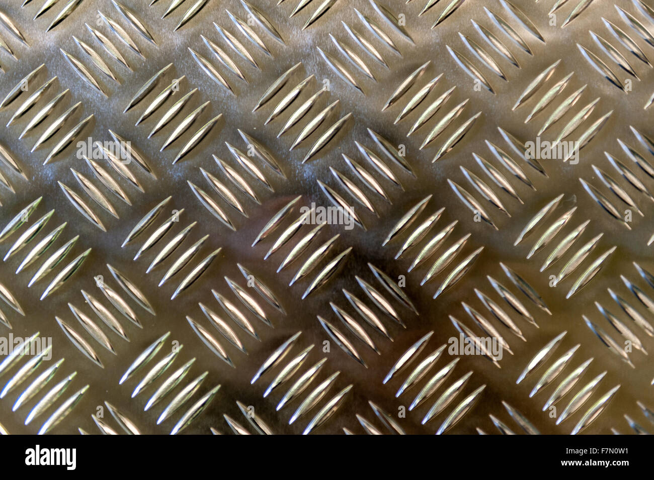 Metallic plate with a grid imposed pattern for gripping Stock Photo